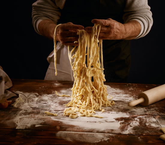 Someone hand making fresh pasta