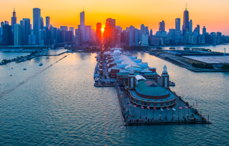 View of Navy Pier in Chicago and skyline at sunset